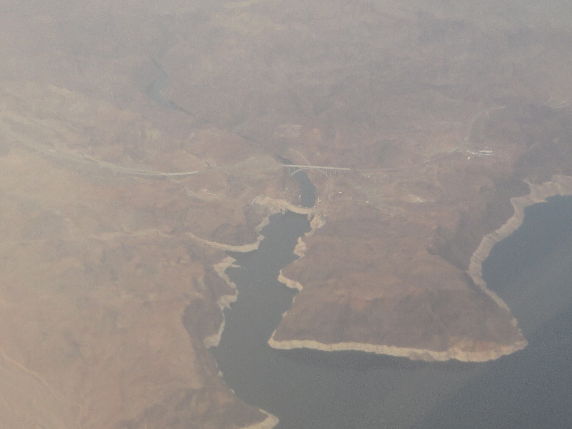 aerial view of a large body of water and surrounding landscape